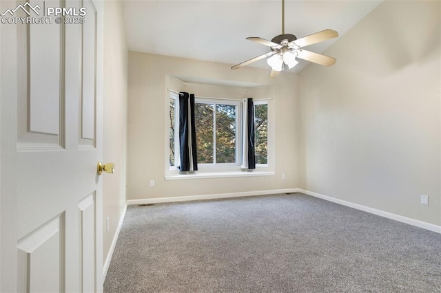 carpeted empty room with ceiling fan