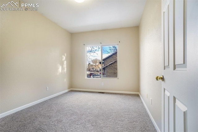 view of carpeted spare room