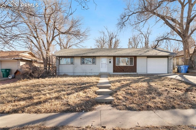 ranch-style home with a garage