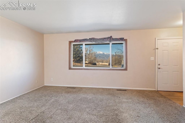 empty room with carpet floors