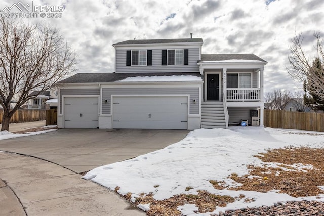 view of front of property with a garage