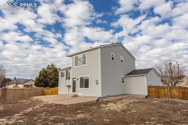 back of property featuring a patio area