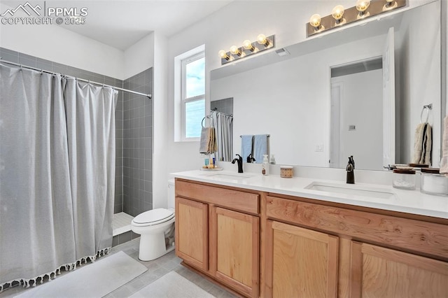 2315 Sunrise Ln, Pueblo, CO 81008 - bathroom featuring vanity, toilet, and curtained shower