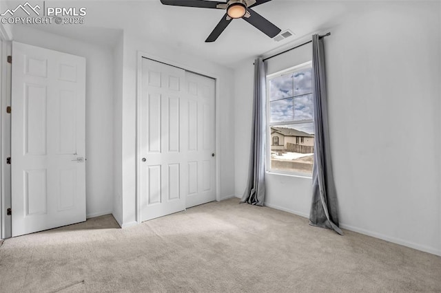2315 Sunrise Ln, Pueblo, CO 81008 - unfurnished bedroom with ceiling fan, light colored carpet, and a closet