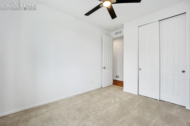 2315 Sunrise Ln, Pueblo, CO 81008 - unfurnished bedroom with ceiling fan, a closet, and light carpet
