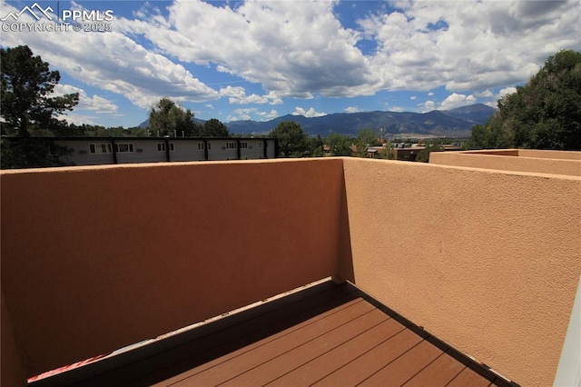 balcony featuring a mountain view