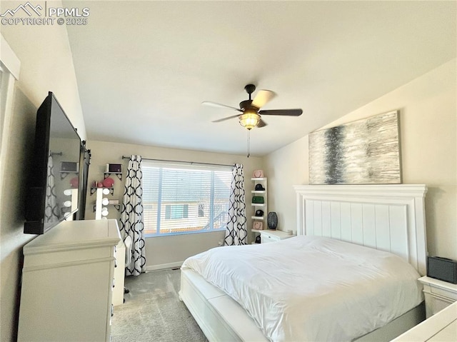 bedroom with light colored carpet and ceiling fan