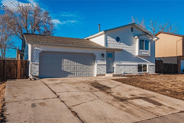 view of front of property featuring a garage