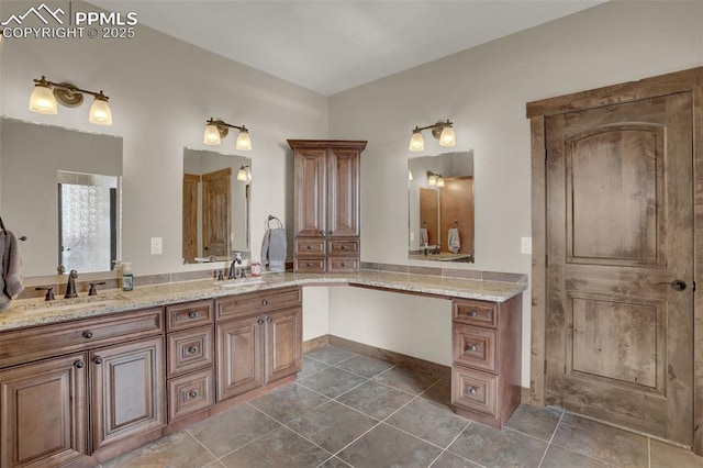 bathroom featuring vanity and tile patterned flooring