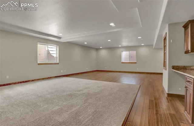 spare room with light hardwood / wood-style floors