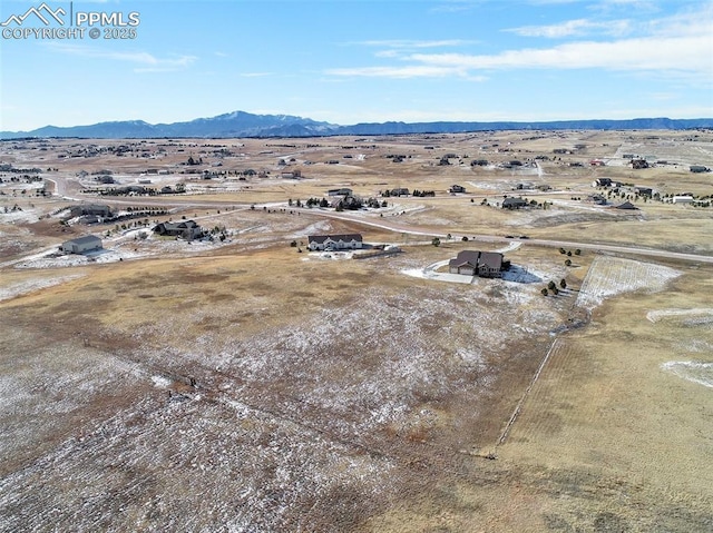 aerial view with a rural view and a mountain view