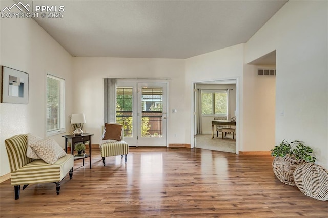 sitting room featuring hardwood / wood-style flooring