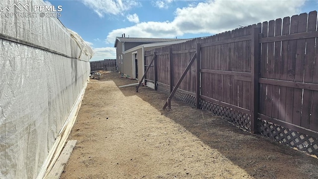 view of yard featuring fence