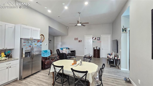 dining space featuring light wood finished floors, visible vents, a ceiling fan, and recessed lighting