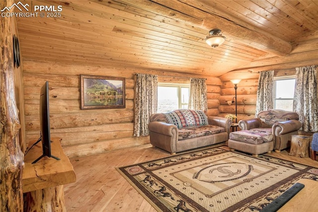 living room featuring vaulted ceiling with beams, wood ceiling, and light hardwood / wood-style flooring