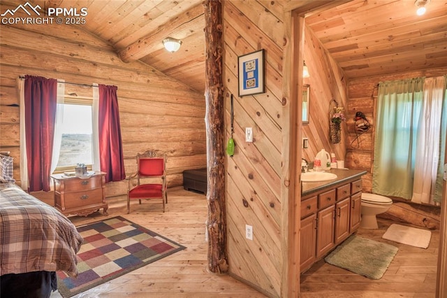 bedroom with vaulted ceiling with beams, log walls, and wooden ceiling