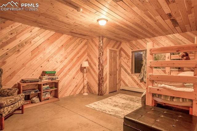 interior space featuring wooden walls, concrete flooring, and wooden ceiling