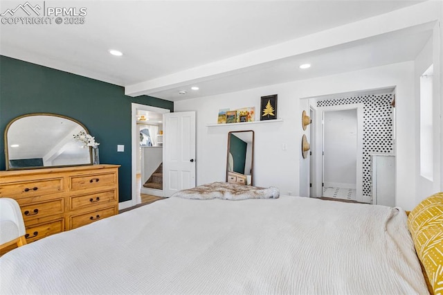 bedroom featuring beamed ceiling