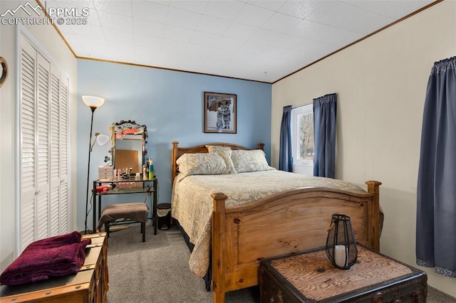 carpeted bedroom with ornamental molding