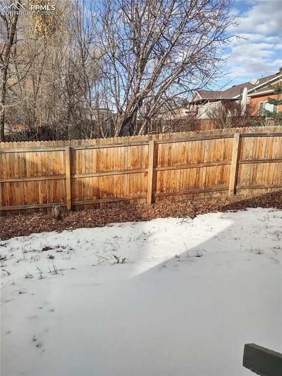 view of snowy yard