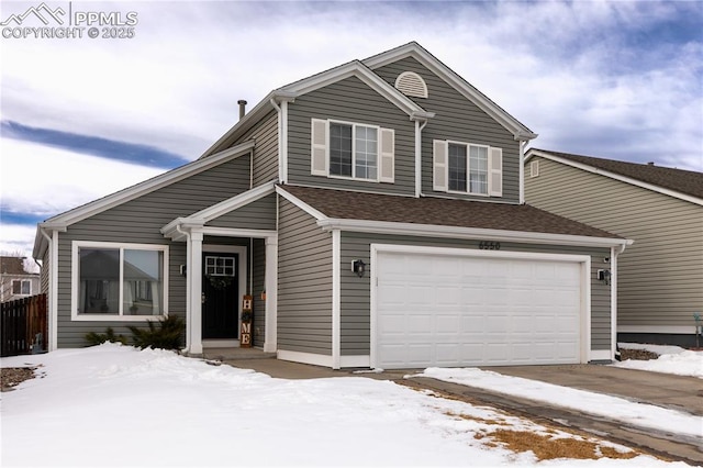 view of front of home with a garage