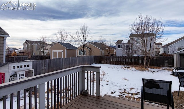 view of snow covered deck