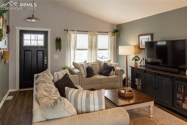 living room featuring lofted ceiling and dark wood-type flooring