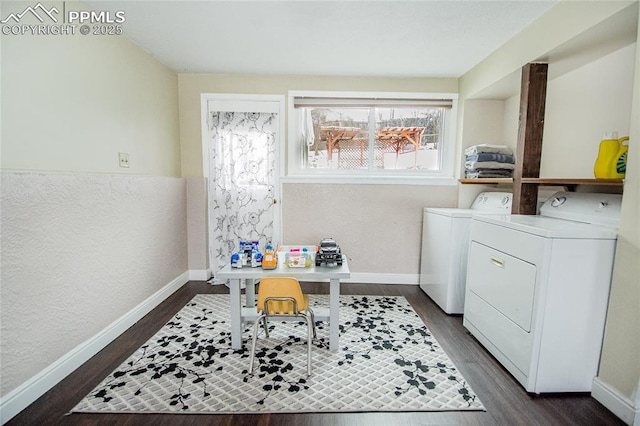 517 W Ramona Ave, Colorado Springs, CO 80905 - clothes washing area featuring washing machine and dryer and dark hardwood / wood-style flooring