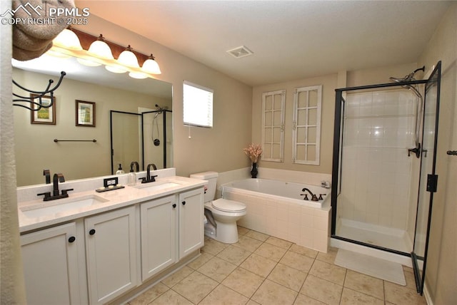 full bathroom with vanity, tile patterned floors, plus walk in shower, and toilet