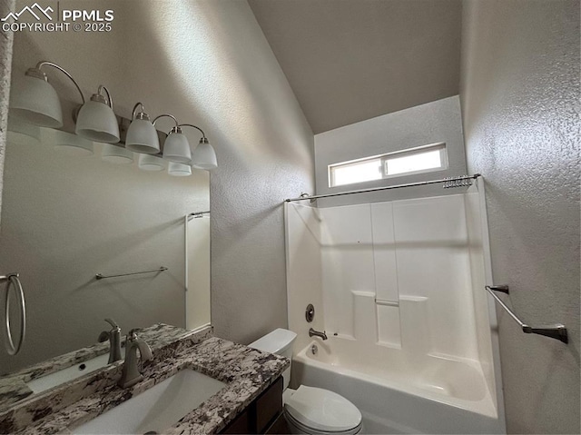 full bathroom featuring shower / tub combination, vanity, and toilet