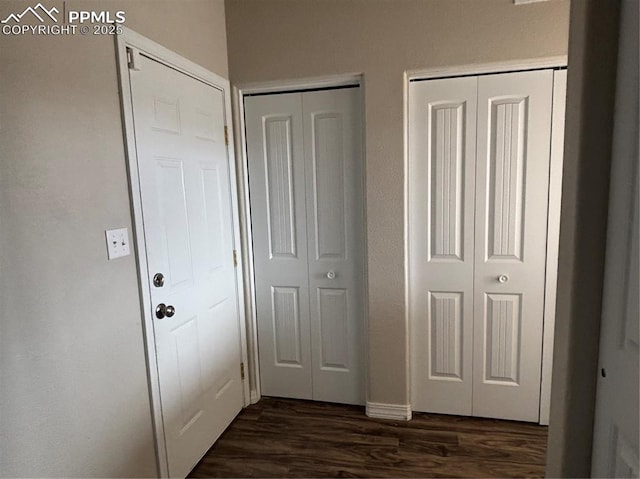 interior space with dark hardwood / wood-style floors