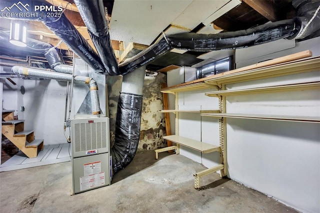 basement featuring heating unit