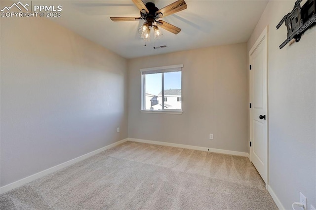 carpeted empty room with ceiling fan