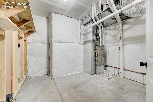 basement featuring heating unit