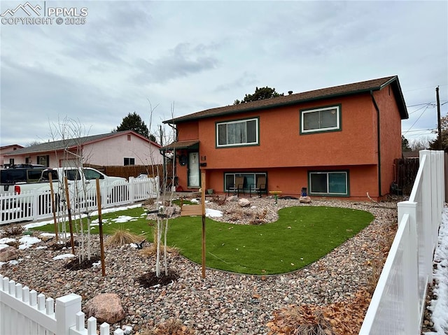 view of front of property with a front lawn