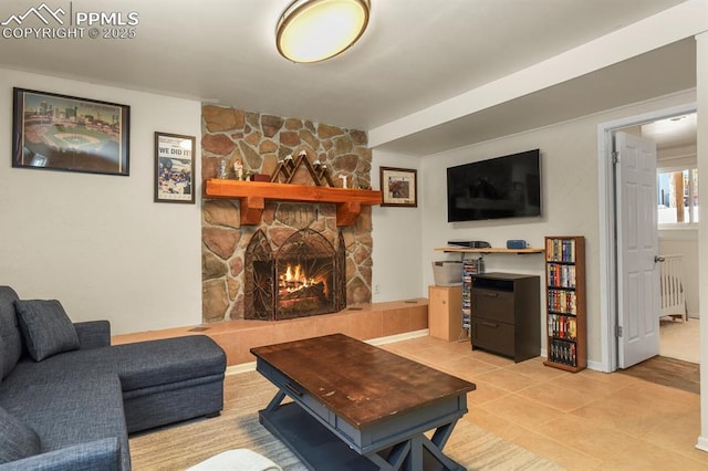 tiled living room featuring a fireplace