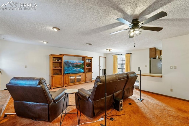 living room with carpet flooring, a textured ceiling, and ceiling fan