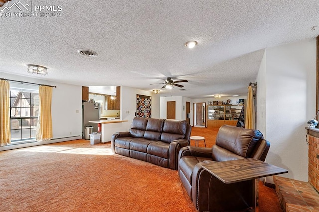 carpeted living room with a textured ceiling, ceiling fan, and baseboard heating