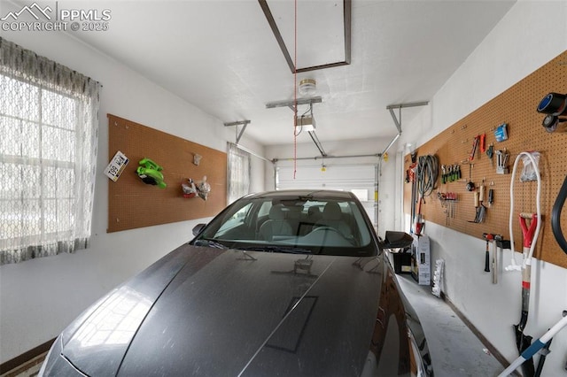 garage featuring a garage door opener