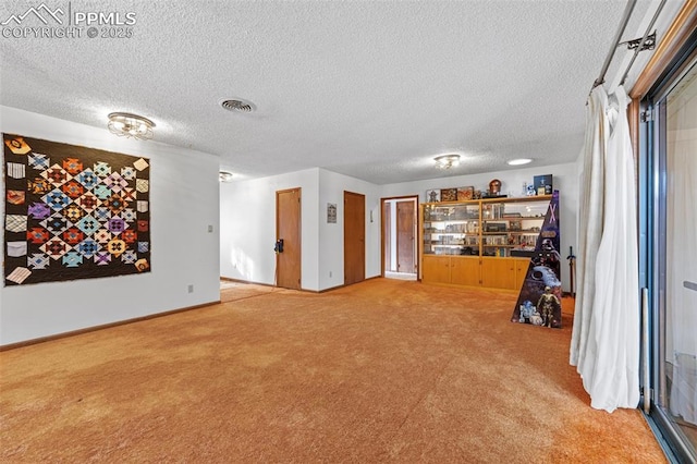 interior space featuring a textured ceiling