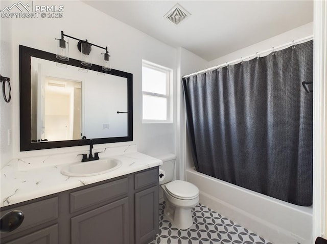 full bathroom with shower / bath combination with curtain, vanity, and toilet