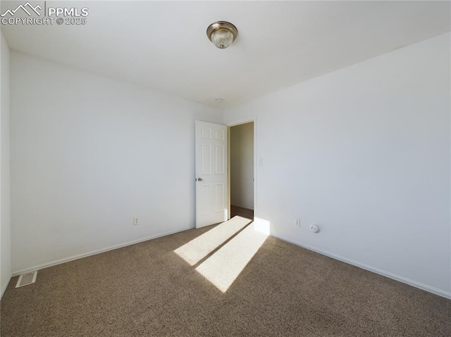 view of carpeted spare room