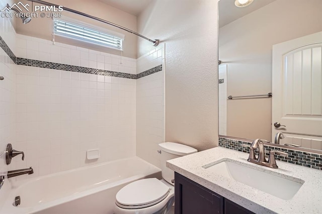 full bath featuring decorative backsplash, toilet, shower / washtub combination, and vanity