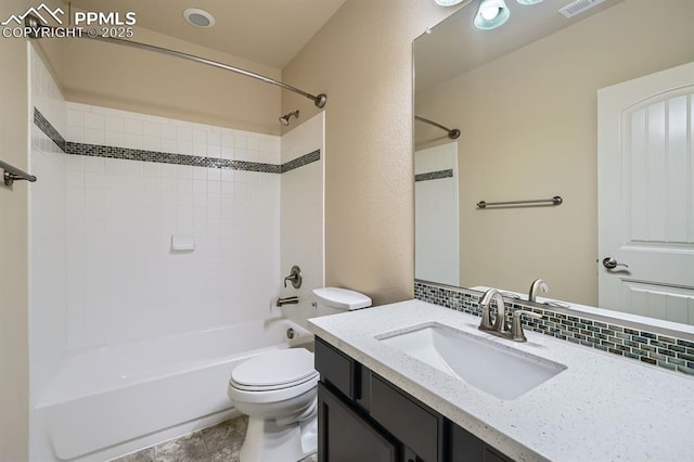 full bathroom with vanity, shower / bathing tub combination, toilet, and backsplash