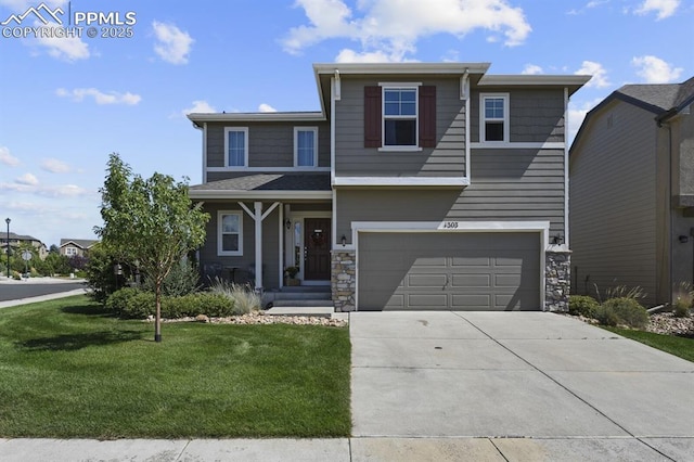 view of front of house featuring a garage and a front lawn