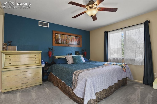 carpeted bedroom with ceiling fan