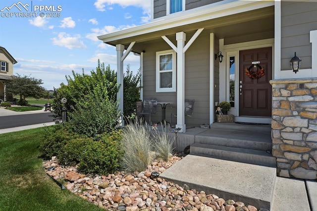 entrance to property with a porch