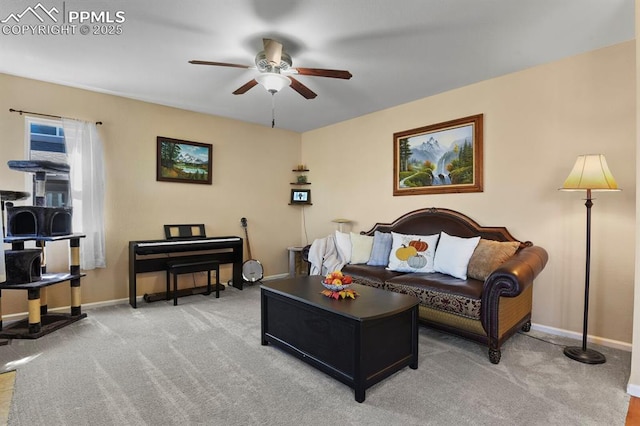 carpeted living room featuring ceiling fan