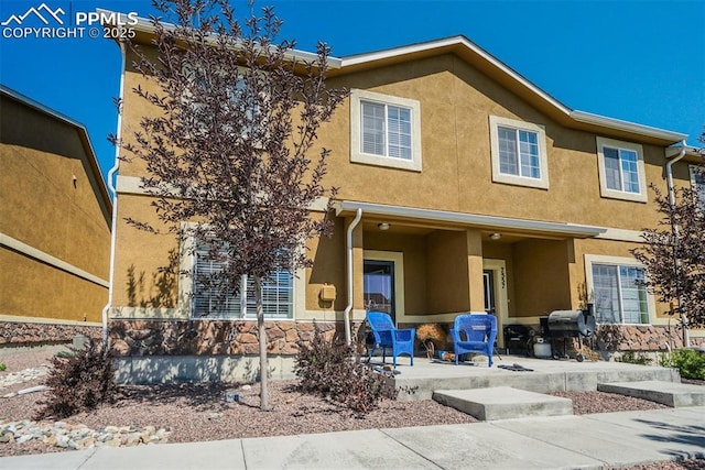 view of front of house with a patio