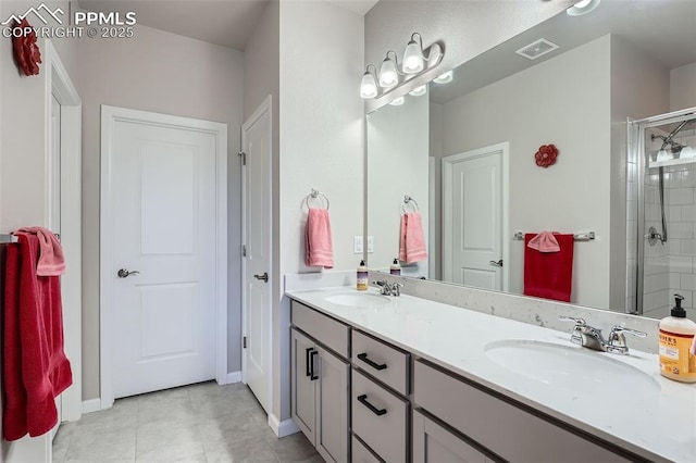 bathroom featuring vanity and a shower with door